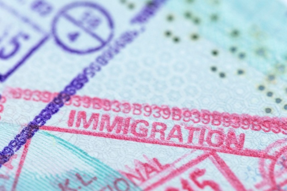 Immigration,Stamp,In,A,Passport