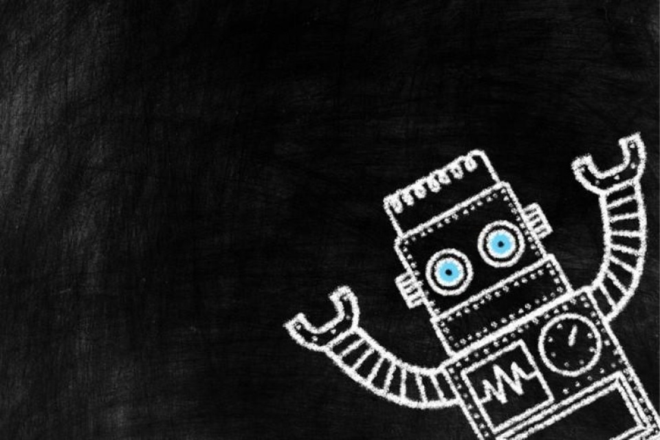 Zwart bord met een getekende speelgoed  robot